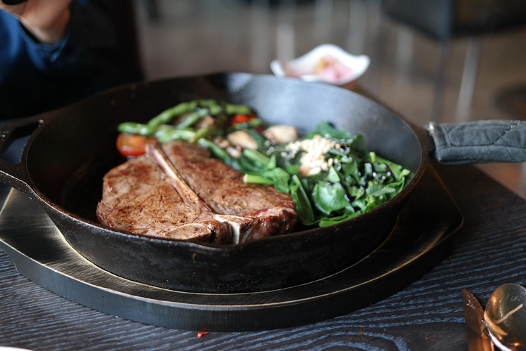 T-Bone Steak with Spinach and Mushrooms